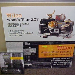 Next person who purchases the new WILCO “Alpha Mike Foxtrot: Rare Tracks 1994-2014″ 4-LP plus book VINYL box set, will receive this super-cool 36″ x 36″ promotional, mounted, album cover art piece!