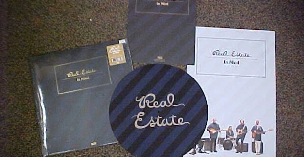 Purchase the fabulous new REAL ESTATE “In Mind” LP, and receive this super-cool Real Estate turntable mat!