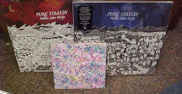 Purchase the fabulous new FATHER JOHN MISTY “Pure Comedy” LP (standard or deluxe edition), and receive a FREE FJM 7″ (w/TWO non-LP tracks!). While supplies last!